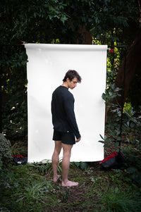 Cinder | EDN Genesis mens long sleeve on-body rear view, organic cotton