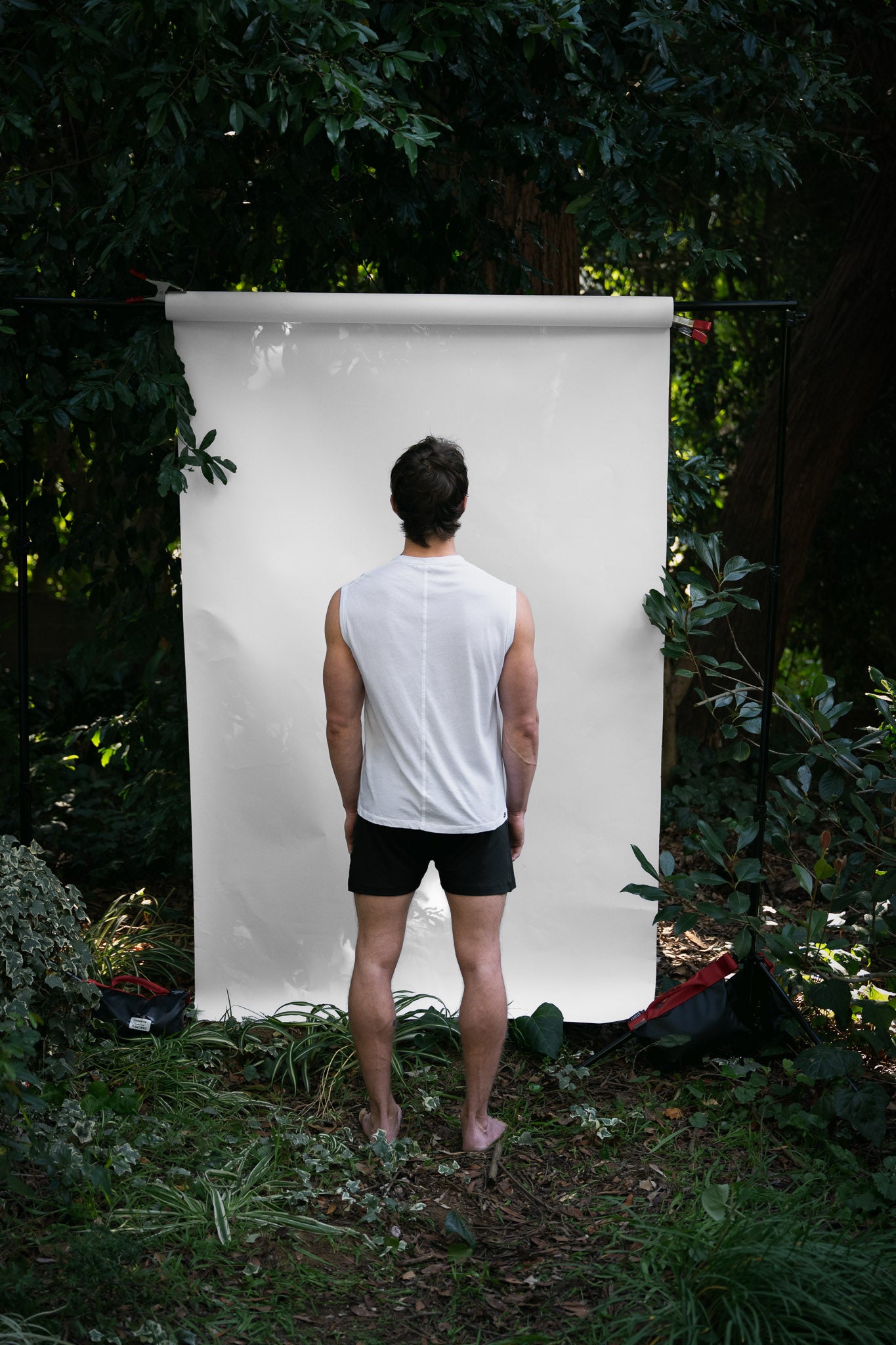 Alabaster | EDN Genesis mens muscle tee on-body rear view, organic cotton