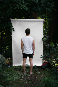 Alabaster | EDN Genesis mens muscle tee on-body rear view, organic cotton