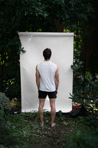 Alabaster | EDN Genesis mens muscle tee on-body rear view, organic cotton