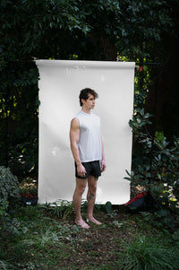 Alabaster | EDN Genesis mens muscle tee on-body side view, organic cotton