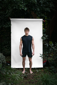 Cinder | EDN Genesis mens muscle tee on-body front view, organic cotton