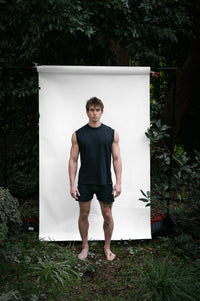 Cinder | EDN Genesis mens muscle tee on-body front view, organic cotton