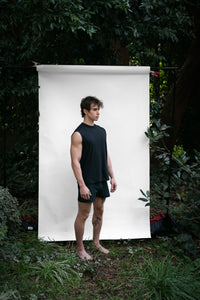 Cinder | EDN Genesis mens muscle tee on-body side view, organic cotton