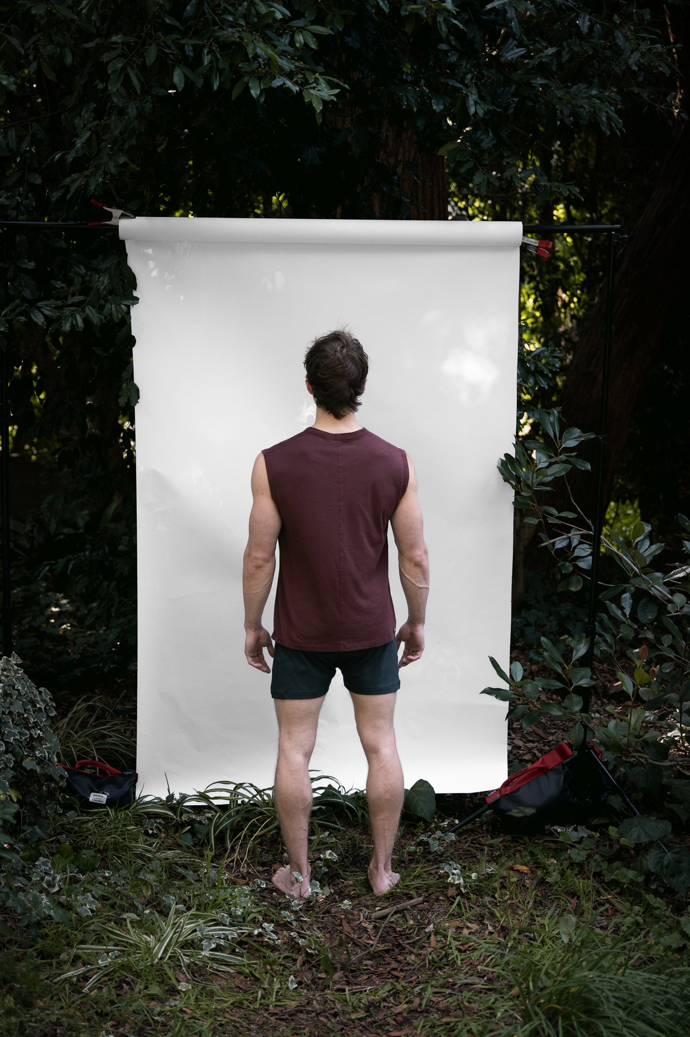 Clay | EDN Genesis mens muscle tee on-body rear view, organic cotton