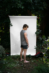 Shale | EDN Genesis mens muscle tee on-body rear view, organic cotton