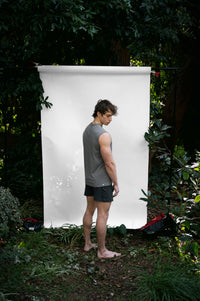 Shale | EDN Genesis mens muscle tee on-body rear view, organic cotton