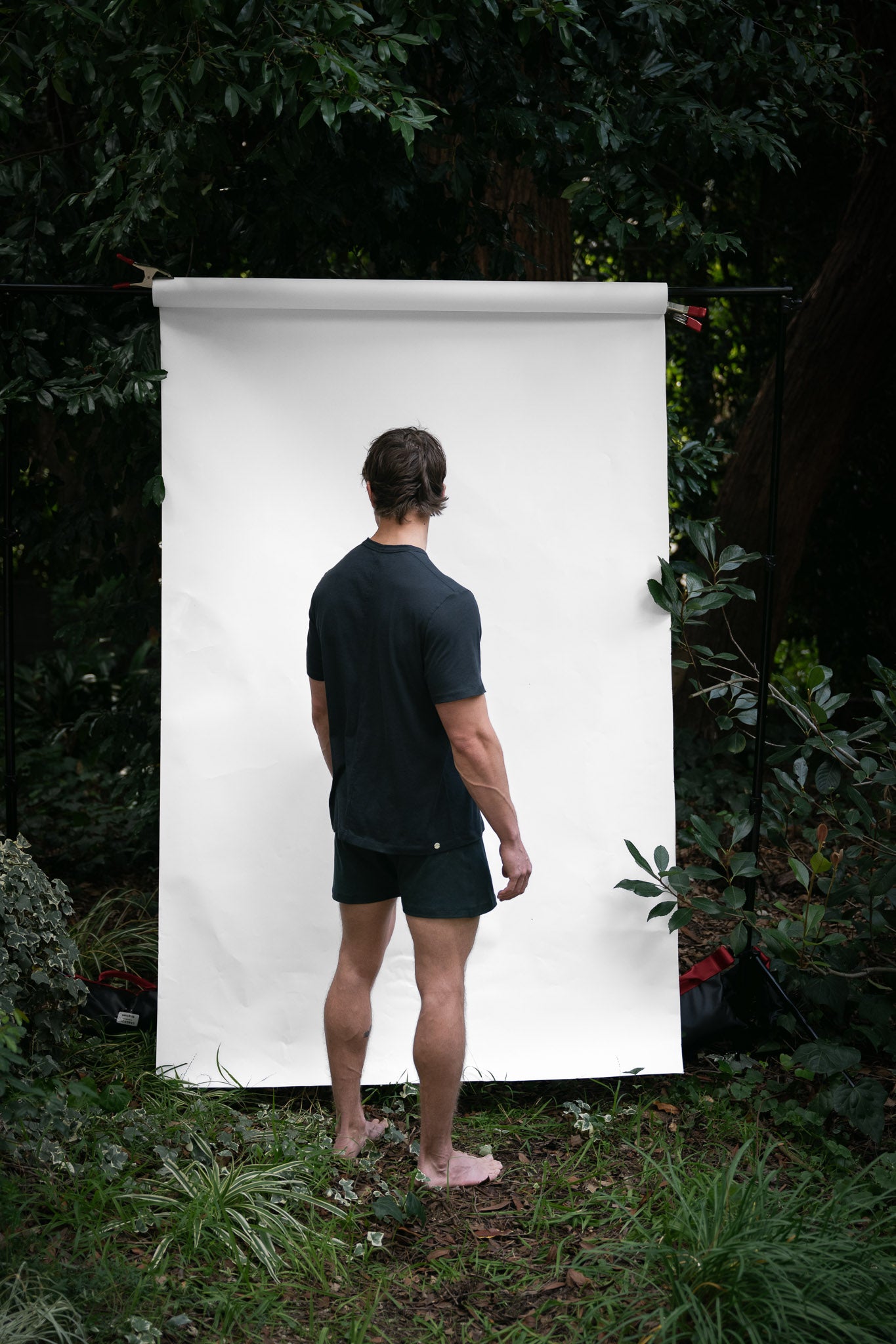 Cinder | EDN Genesis mens t-shirt on-body rear view, organic cotton