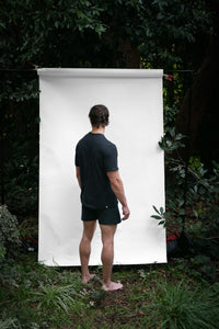 Cinder | EDN Genesis mens t-shirt on-body rear view, organic cotton
