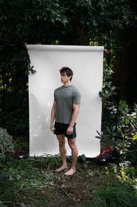 Shale | EDN Genesis mens t-shirt on-body side view, organic cotton