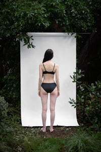 Cinder | EDN Genesis womens bralette rear view on body, organic cotton